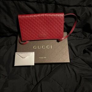 Red Gucci crossbody purse